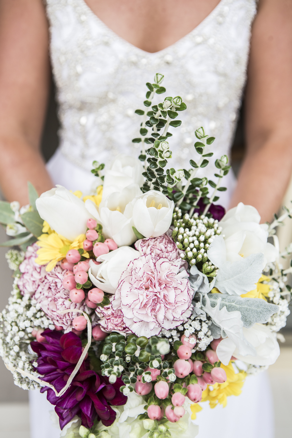 Stunning bouquet with beaded dress as background